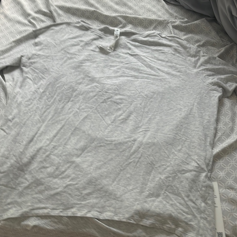 NEW WITH TAGS NEVER WORN LULULEMON SHIRT